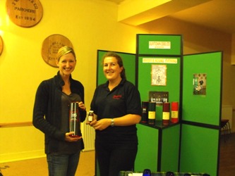 Glenfarclas nosing competition winner Meagan Goodbridge receives her prize from Kate Wright