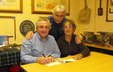 Signing the cheque for new building - Gordon, Glo and Ren&eacute;