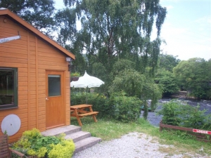 Your Lodge looks directly onto the River Spey.